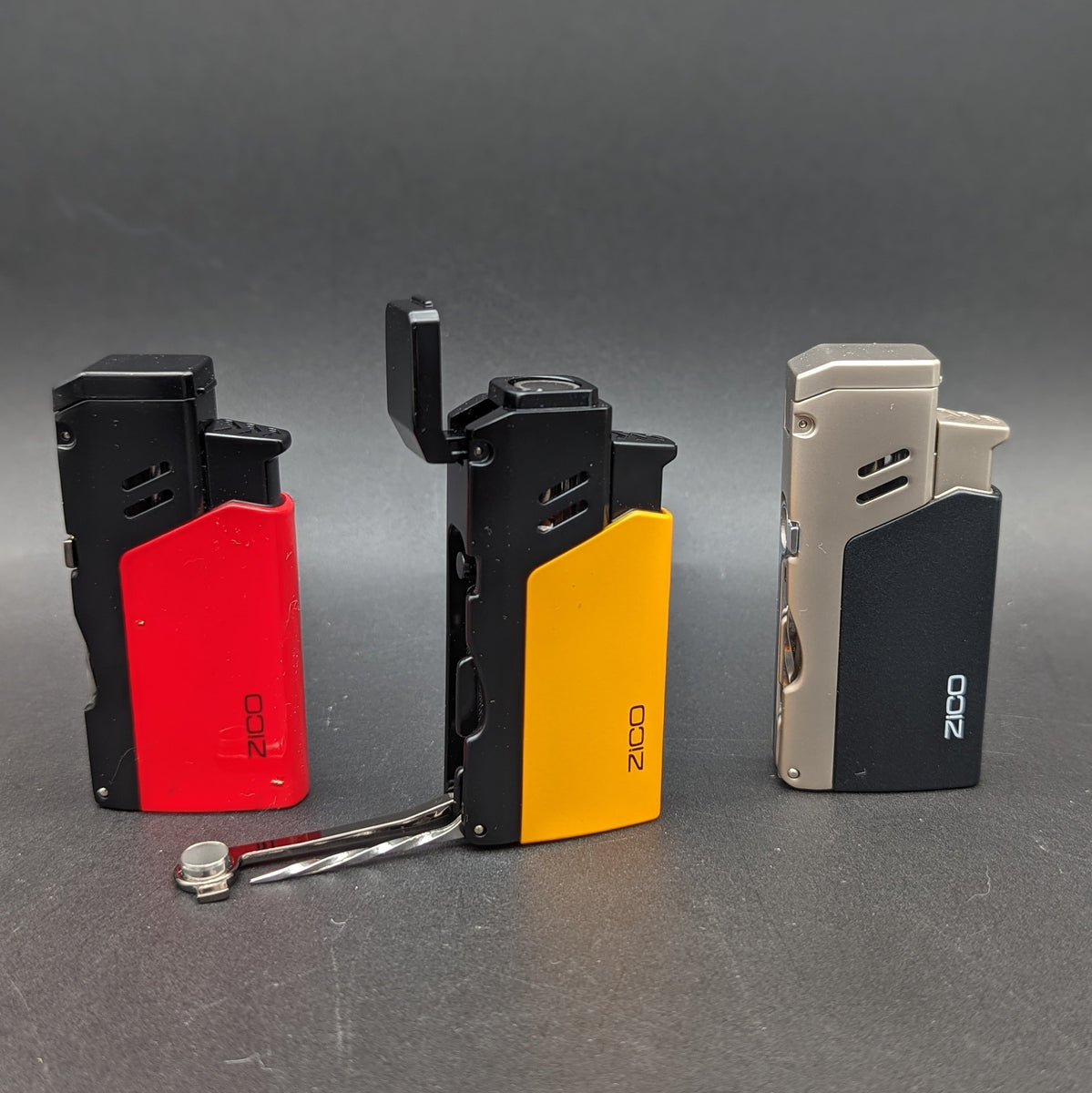 Zico Flip-Top Quad Flame Torch Lighter with Built-in Pipe Tools